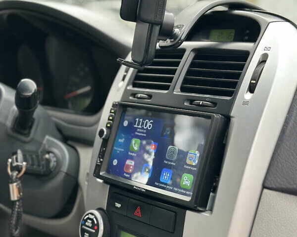 Серый Киа Черато, объемом двигателя 1.58 л и пробегом 495 тыс. км за 3900 $, фото 10 на Automoto.ua