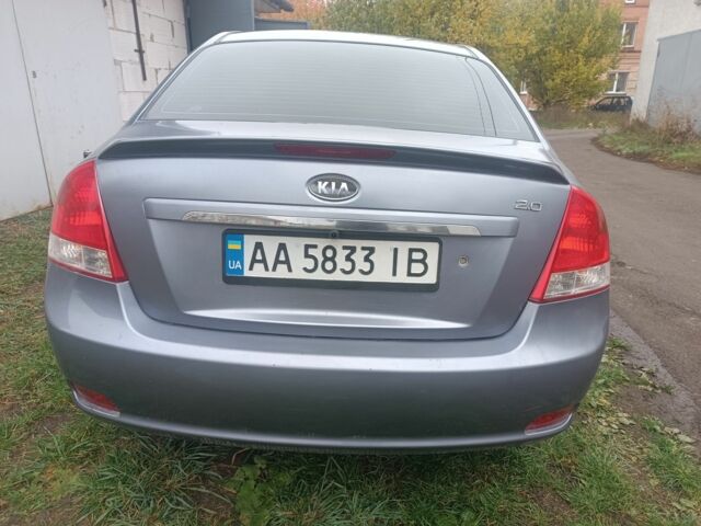 Серый Киа Черато, объемом двигателя 2 л и пробегом 237 тыс. км за 3000 $, фото 1 на Automoto.ua
