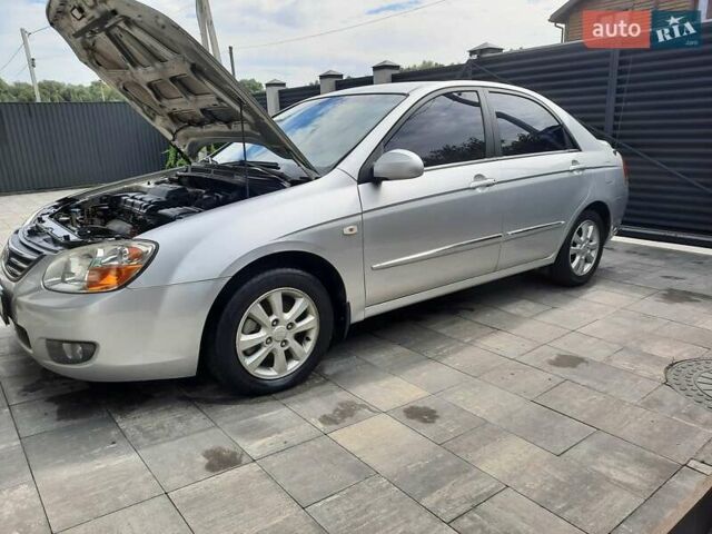 Сірий Кіа Черато, об'ємом двигуна 2 л та пробігом 192 тис. км за 4700 $, фото 1 на Automoto.ua