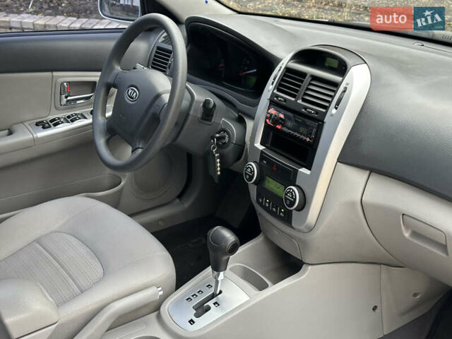 Сірий Кіа Черато, об'ємом двигуна 2 л та пробігом 192 тис. км за 5100 $, фото 7 на Automoto.ua