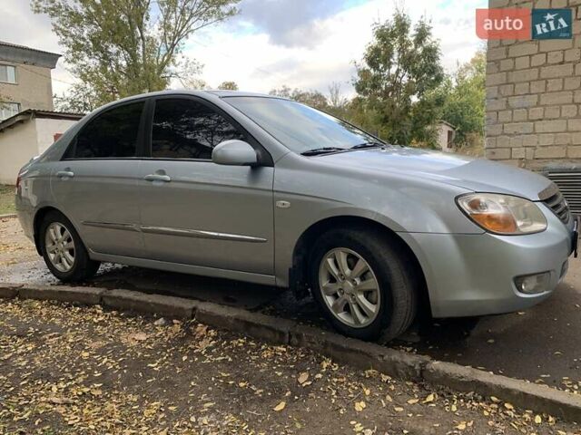 Сірий Кіа Черато, об'ємом двигуна 2 л та пробігом 199 тис. км за 5099 $, фото 1 на Automoto.ua