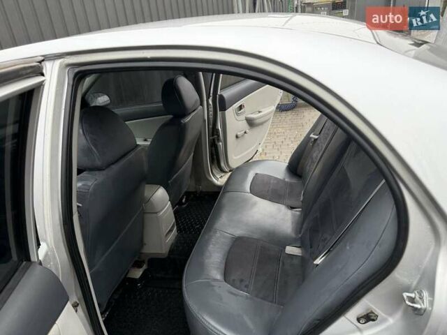 Серый Киа Черато, объемом двигателя 1.59 л и пробегом 205 тыс. км за 4600 $, фото 3 на Automoto.ua