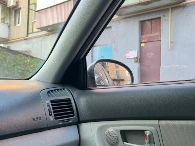 Серый Киа Черато, объемом двигателя 1.6 л и пробегом 1000 тыс. км за 4999 $, фото 3 на Automoto.ua