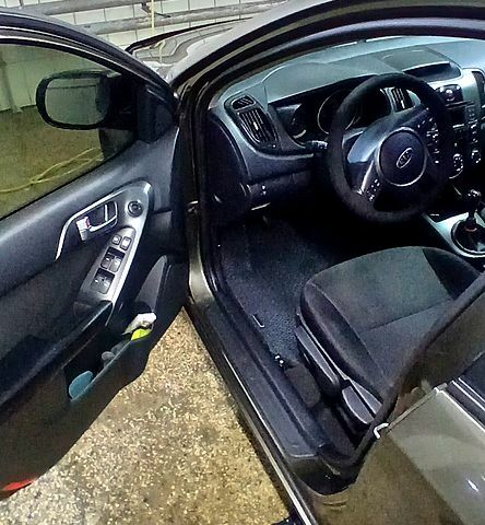 Серый Киа Черато, объемом двигателя 2 л и пробегом 250 тыс. км за 7200 $, фото 7 на Automoto.ua