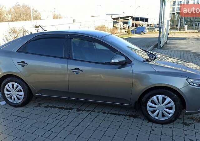 Сірий Кіа Черато, об'ємом двигуна 2 л та пробігом 196 тис. км за 7150 $, фото 6 на Automoto.ua