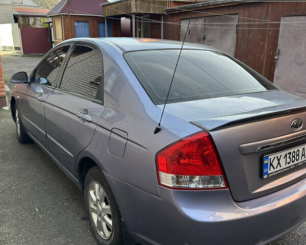 Серый Киа Черато, объемом двигателя 1.98 л и пробегом 246 тыс. км за 3900 $, фото 3 на Automoto.ua