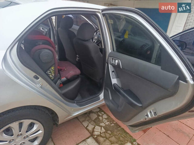 Сірий Кіа Черато, об'ємом двигуна 2 л та пробігом 235 тис. км за 6300 $, фото 1 на Automoto.ua