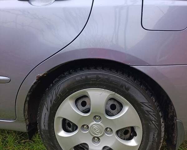 Серый Киа Черато, объемом двигателя 1.6 л и пробегом 200 тыс. км за 4100 $, фото 2 на Automoto.ua