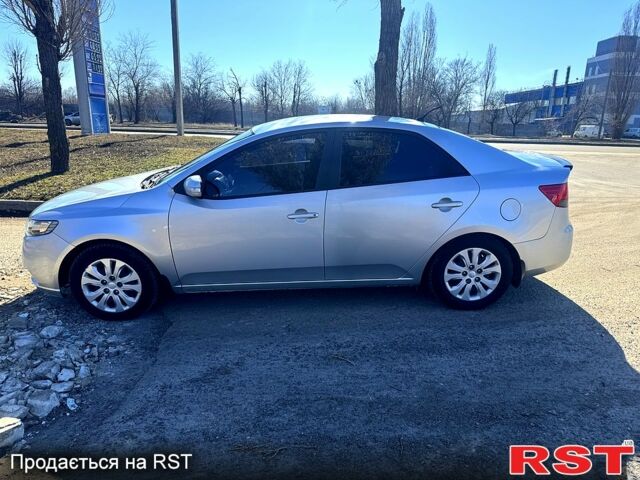 Серый Киа Черато, объемом двигателя 2 л и пробегом 240 тыс. км за 6200 $, фото 1 на Automoto.ua