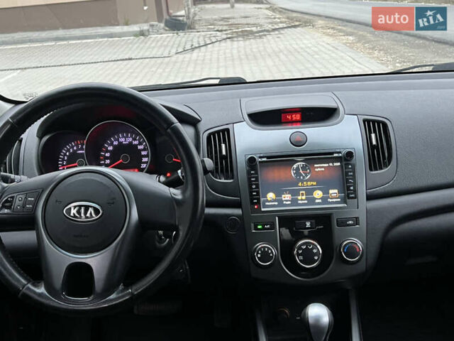 Серый Киа Черато, объемом двигателя 1.6 л и пробегом 188 тыс. км за 6999 $, фото 39 на Automoto.ua