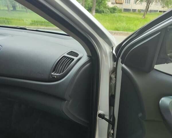 Сірий Кіа Черато, об'ємом двигуна 1.6 л та пробігом 136 тис. км за 7050 $, фото 10 на Automoto.ua