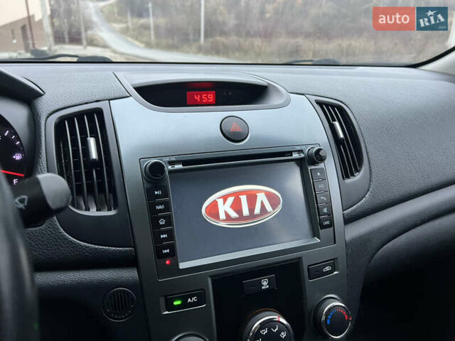 Серый Киа Черато, объемом двигателя 1.6 л и пробегом 188 тыс. км за 6999 $, фото 54 на Automoto.ua
