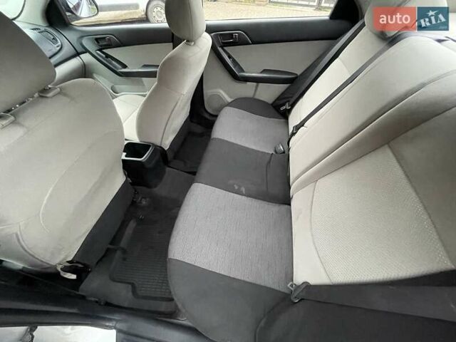 Серый Киа Черато, объемом двигателя 1.6 л и пробегом 224 тыс. км за 5400 $, фото 7 на Automoto.ua