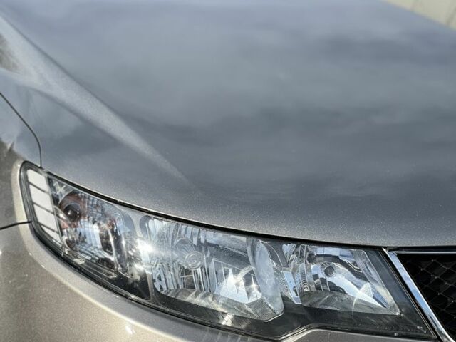 Сірий Кіа Черато, об'ємом двигуна 1.6 л та пробігом 117 тис. км за 7777 $, фото 10 на Automoto.ua