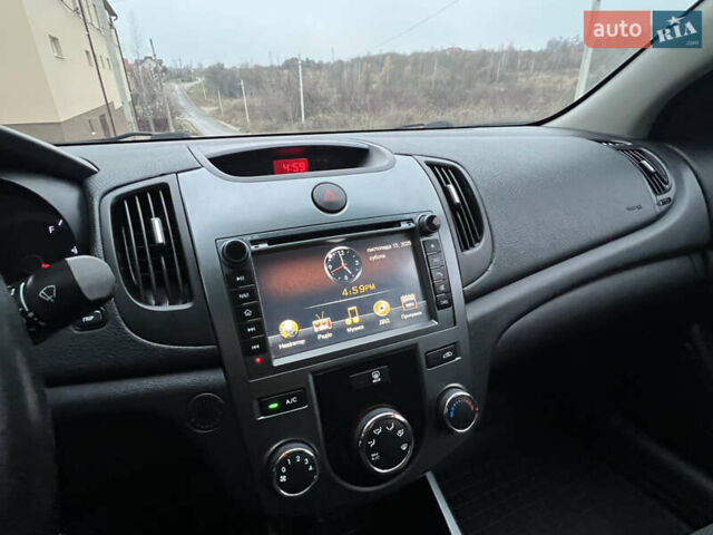 Серый Киа Черато, объемом двигателя 1.6 л и пробегом 188 тыс. км за 6999 $, фото 56 на Automoto.ua