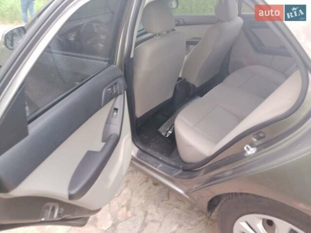 Серый Киа Черато, объемом двигателя 1.6 л и пробегом 267 тыс. км за 6500 $, фото 7 на Automoto.ua