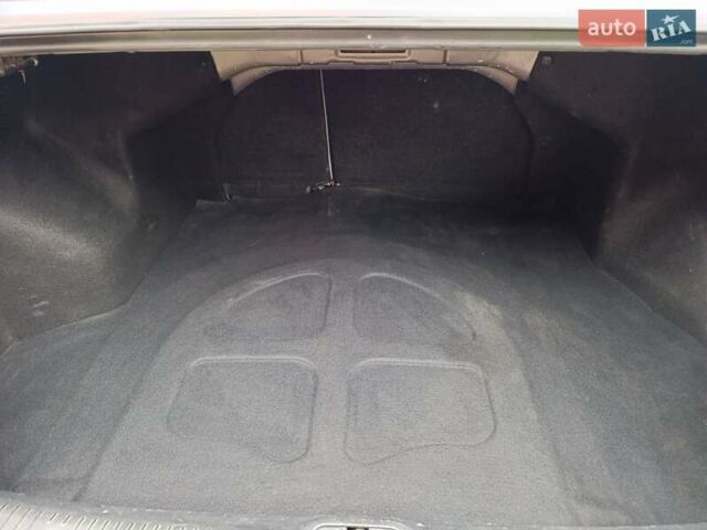 Серый Киа Черато, объемом двигателя 1.6 л и пробегом 200 тыс. км за 4100 $, фото 13 на Automoto.ua