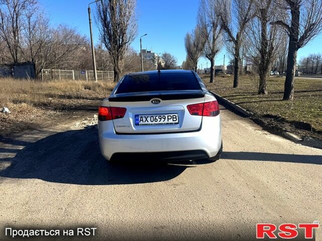 Серый Киа Черато, объемом двигателя 2 л и пробегом 240 тыс. км за 6200 $, фото 4 на Automoto.ua