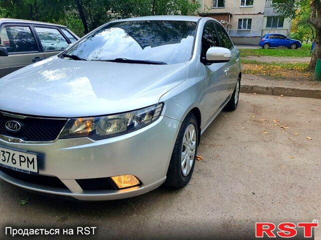 Серый Киа Черато, объемом двигателя 2 л и пробегом 230 тыс. км за 6300 $, фото 1 на Automoto.ua