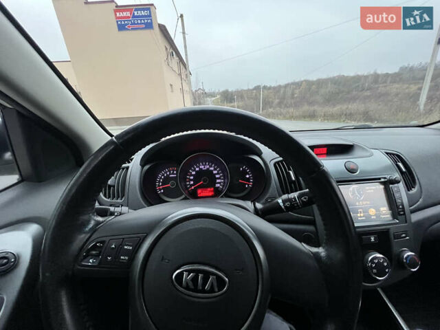 Серый Киа Черато, объемом двигателя 1.6 л и пробегом 188 тыс. км за 6999 $, фото 55 на Automoto.ua