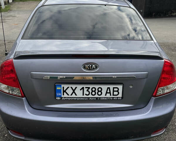 Серый Киа Черато, объемом двигателя 2 л и пробегом 245 тыс. км за 3900 $, фото 3 на Automoto.ua