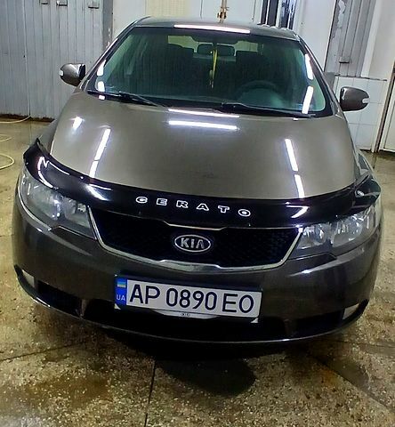 Серый Киа Черато, объемом двигателя 2 л и пробегом 250 тыс. км за 7200 $, фото 1 на Automoto.ua