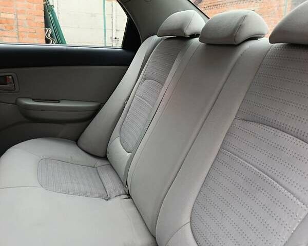 Серый Киа Черато, объемом двигателя 1.6 л и пробегом 200 тыс. км за 4100 $, фото 9 на Automoto.ua