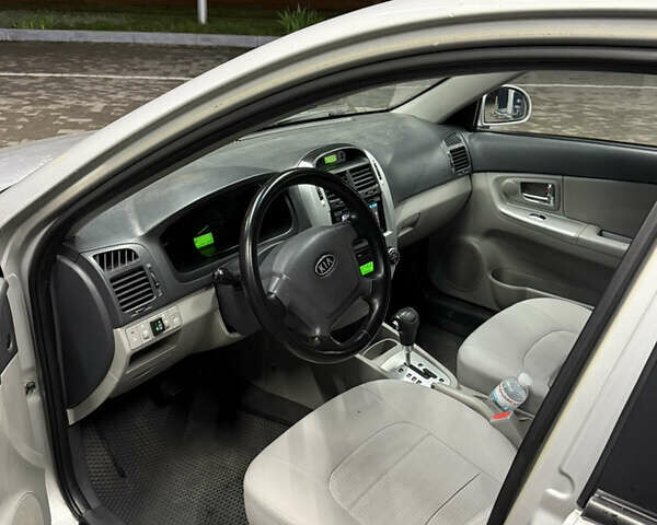 Сірий Кіа Черато, об'ємом двигуна 2 л та пробігом 234 тис. км за 4700 $, фото 2 на Automoto.ua