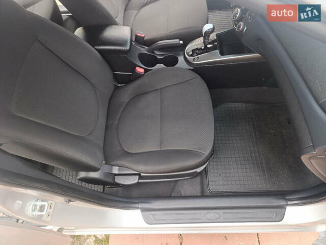 Сірий Кіа Черато, об'ємом двигуна 2 л та пробігом 235 тис. км за 6300 $, фото 4 на Automoto.ua