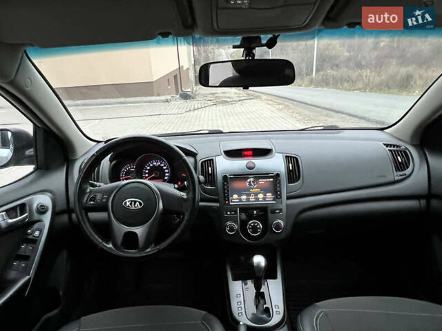 Серый Киа Черато, объемом двигателя 1.6 л и пробегом 188 тыс. км за 6999 $, фото 38 на Automoto.ua