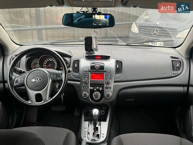Сірий Кіа Черато, об'ємом двигуна 2 л та пробігом 198 тис. км за 6490 $, фото 12 на Automoto.ua