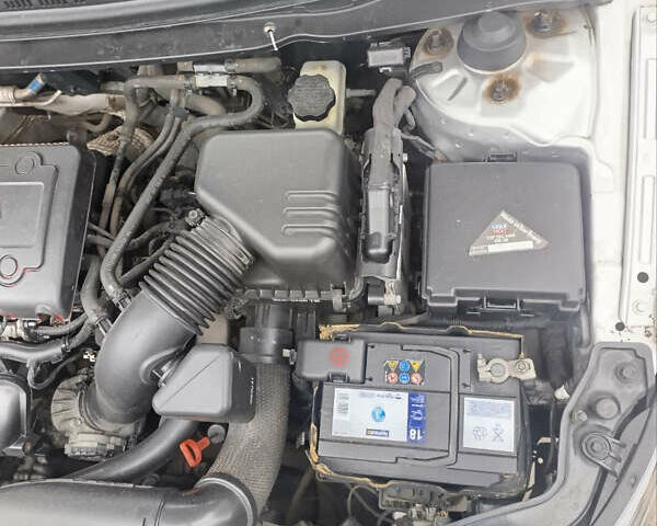 Сірий Кіа Черато, об'ємом двигуна 2 л та пробігом 235 тис. км за 6300 $, фото 14 на Automoto.ua