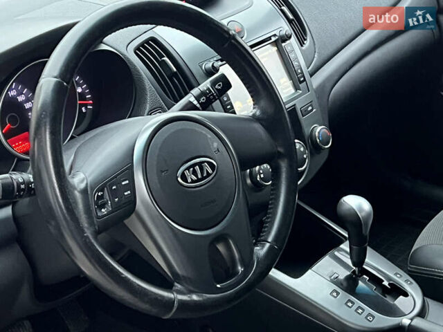 Серый Киа Черато, объемом двигателя 1.6 л и пробегом 188 тыс. км за 6999 $, фото 34 на Automoto.ua