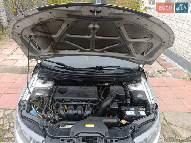 Сірий Кіа Черато, об'ємом двигуна 2 л та пробігом 235 тис. км за 6300 $, фото 15 на Automoto.ua