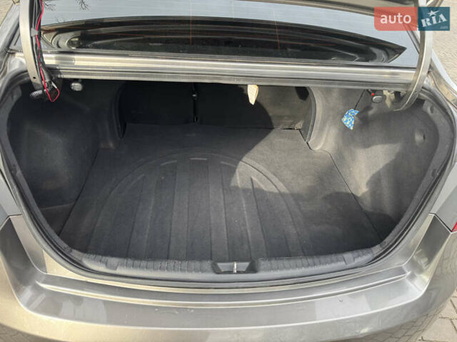 Сірий Кіа Черато, об'ємом двигуна 1.6 л та пробігом 104 тис. км за 7800 $, фото 10 на Automoto.ua