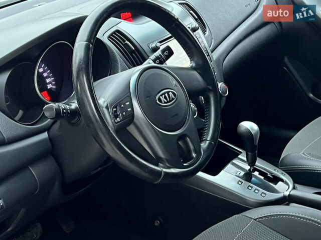 Серый Киа Черато, объемом двигателя 1.6 л и пробегом 188 тыс. км за 6999 $, фото 33 на Automoto.ua