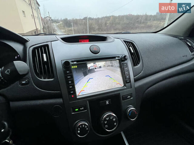 Серый Киа Черато, объемом двигателя 1.6 л и пробегом 188 тыс. км за 6999 $, фото 57 на Automoto.ua