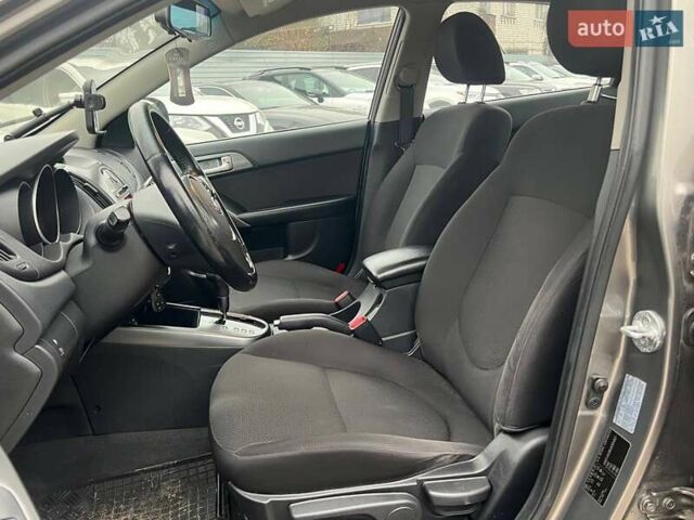 Сірий Кіа Черато, об'ємом двигуна 2 л та пробігом 198 тис. км за 6490 $, фото 8 на Automoto.ua