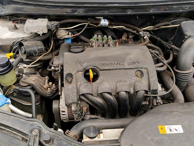 Сірий Кіа Черато, об'ємом двигуна 1.6 л та пробігом 197 тис. км за 6700 $, фото 7 на Automoto.ua