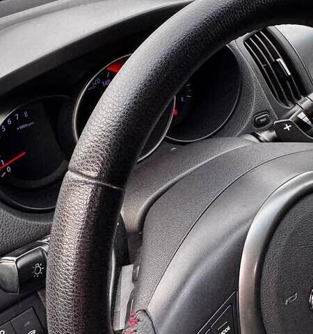 Серый Киа Черато, объемом двигателя 2 л и пробегом 145 тыс. км за 7500 $, фото 8 на Automoto.ua