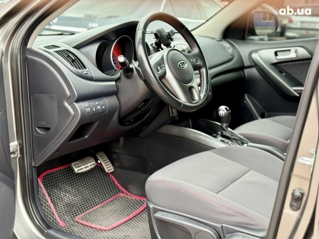 Серый Киа Черато, объемом двигателя 2 л и пробегом 170 тыс. км за 7900 $, фото 8 на Automoto.ua