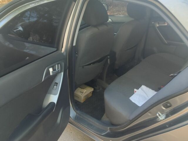 Серый Киа Черато, объемом двигателя 1.6 л и пробегом 218 тыс. км за 6800 $, фото 17 на Automoto.ua