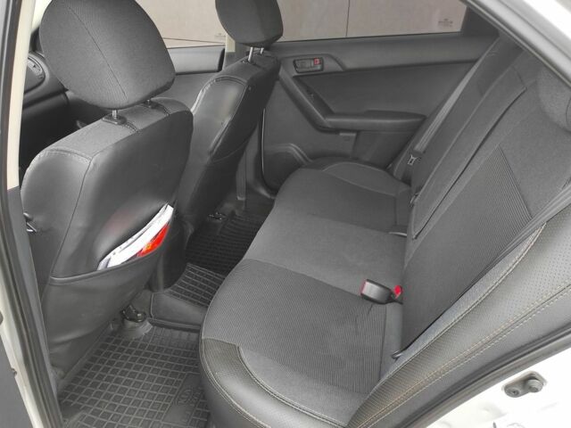 Серый Киа Черато, объемом двигателя 1.6 л и пробегом 88 тыс. км за 9000 $, фото 6 на Automoto.ua