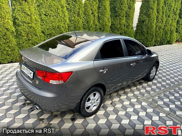 Серый Киа Черато, объемом двигателя 2 л и пробегом 190 тыс. км за 7300 $, фото 7 на Automoto.ua