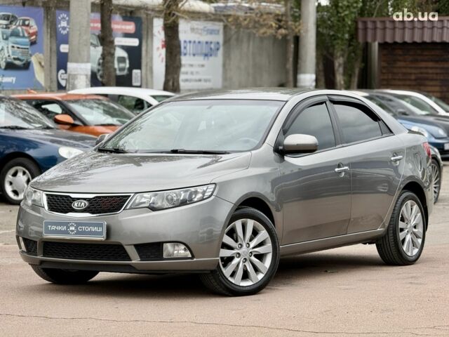 Серый Киа Черато, объемом двигателя 2 л и пробегом 170 тыс. км за 7900 $, фото 6 на Automoto.ua