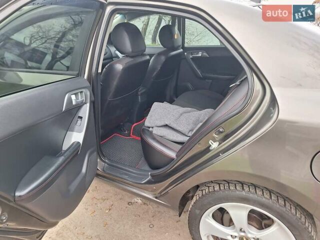 Сірий Кіа Черато, об'ємом двигуна 2 л та пробігом 165 тис. км за 7300 $, фото 6 на Automoto.ua