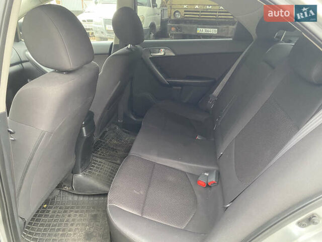 Сірий Кіа Черато, об'ємом двигуна 1.59 л та пробігом 169 тис. км за 7900 $, фото 5 на Automoto.ua