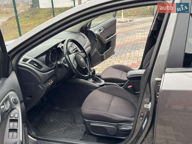 Серый Киа Черато, объемом двигателя 1.6 л и пробегом 141 тыс. км за 9800 $, фото 34 на Automoto.ua