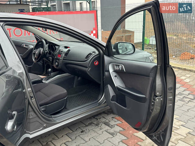 Серый Киа Черато, объемом двигателя 1.6 л и пробегом 141 тыс. км за 9800 $, фото 44 на Automoto.ua