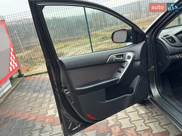 Серый Киа Черато, объемом двигателя 1.6 л и пробегом 141 тыс. км за 9800 $, фото 47 на Automoto.ua